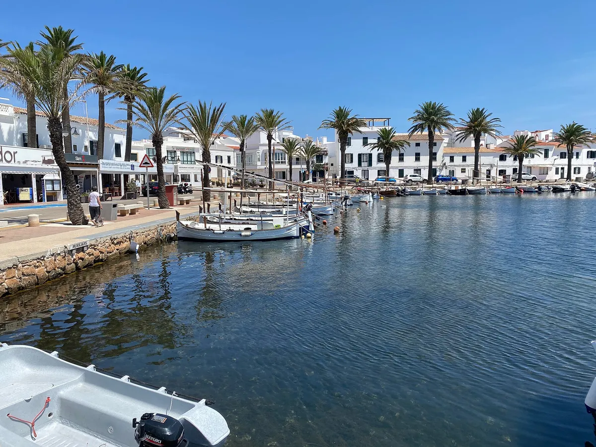 The harbour at Fornells in Menorca, departure point for the marine reserve catamarans and the sunset sail